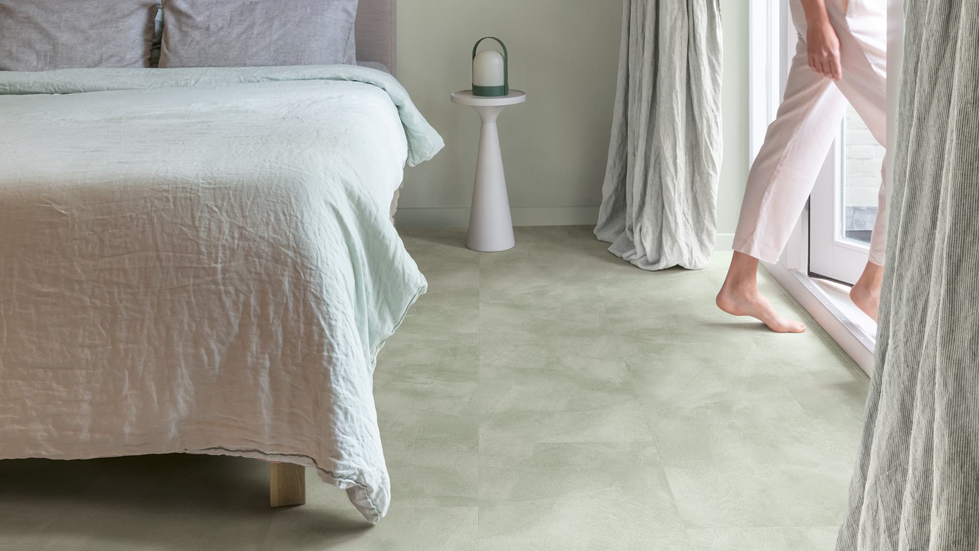 Soft bedroom with green vinyl flooring